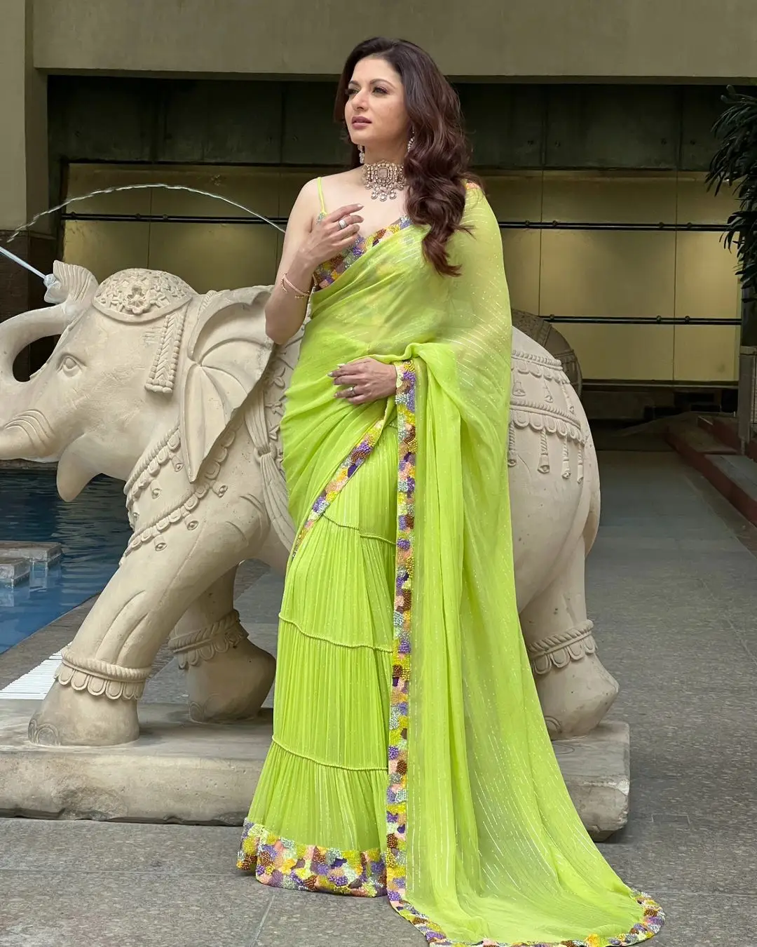 Bollywood Actress Bhagyashree Stills in Lemon Green Saree